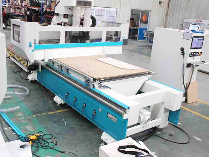 ATC wood CNC machine with nesting loading unloading system for cutting plate for cabinet making - 